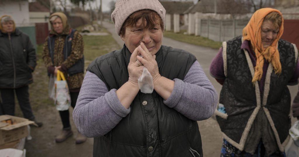 Ukrainische Beamte sagen, dass russische Truppen eine Dorfbürgermeisterin und ihre Familie gefoltert und hingerichtet haben