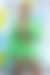 Knalliges Grün ist auf dem VMA-Teppich so angesagt, dass Rapper Latto ein kurzes Schnürkleid in Neonfarbe trägt.
